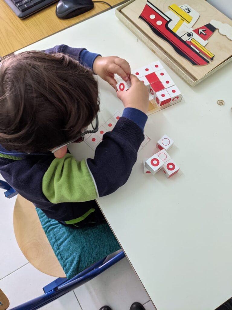 Child playing with patterns